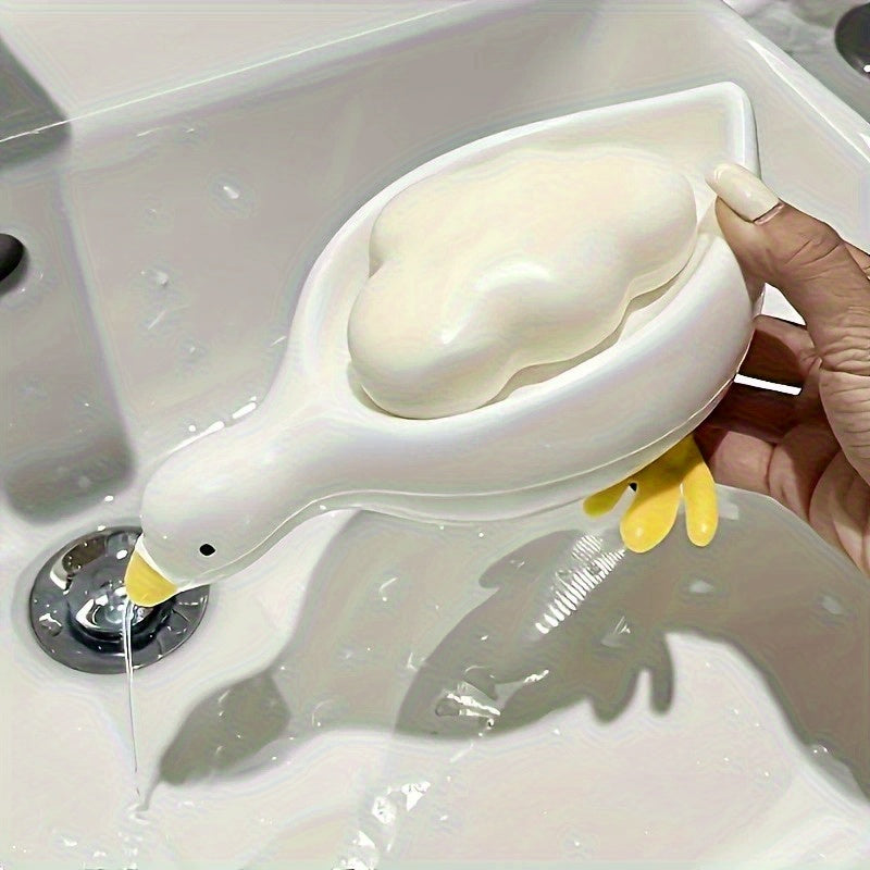 Yellow and White Duck-shaped Soap Dish with an Oval Bathroom Drainage Tray Featuring an Anti-water Accumulation Design. A Gift Suitable for All 4 Seasons, Combining Creativity and Practicality. It Serves as Both a Soap Holder and a Storage for Small